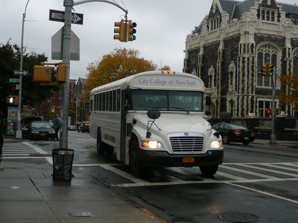 A CCNY-managed bus escorting students around the local neighborhood.